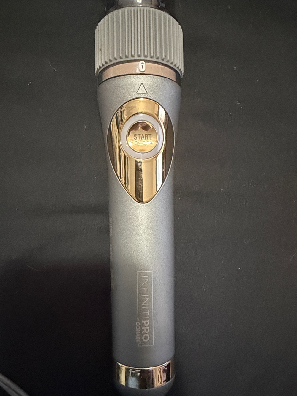 INFINITIPRO Grey and Gold Handheld Hair Tool — Start Button Control